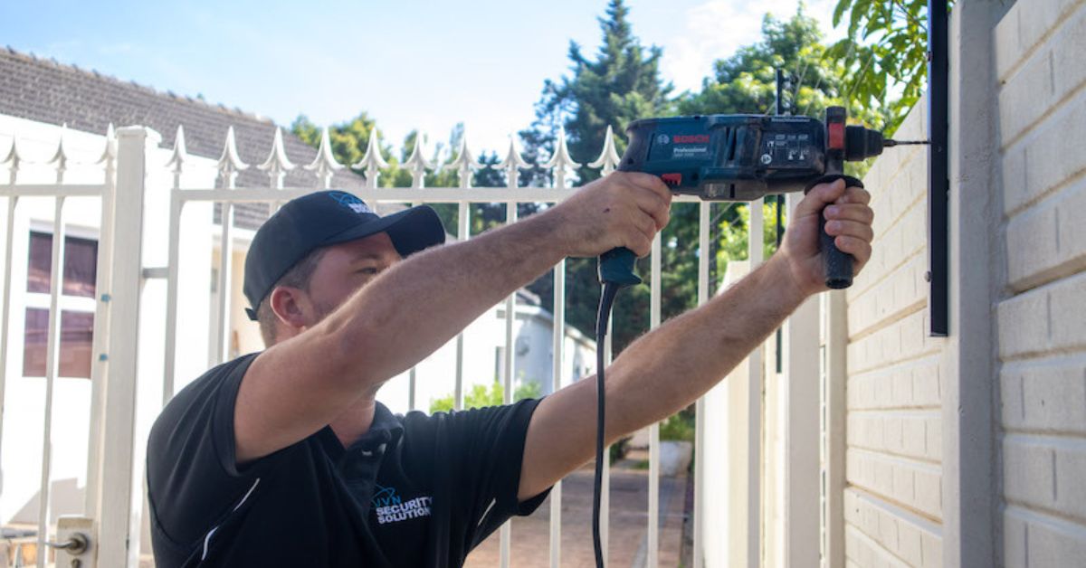 property security Cape Town - JVN Security drilling in electric fencing posts