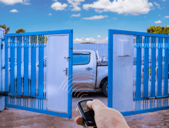 Gate Motor Installation Feature Image- Automatic swing gate opening via a remote control