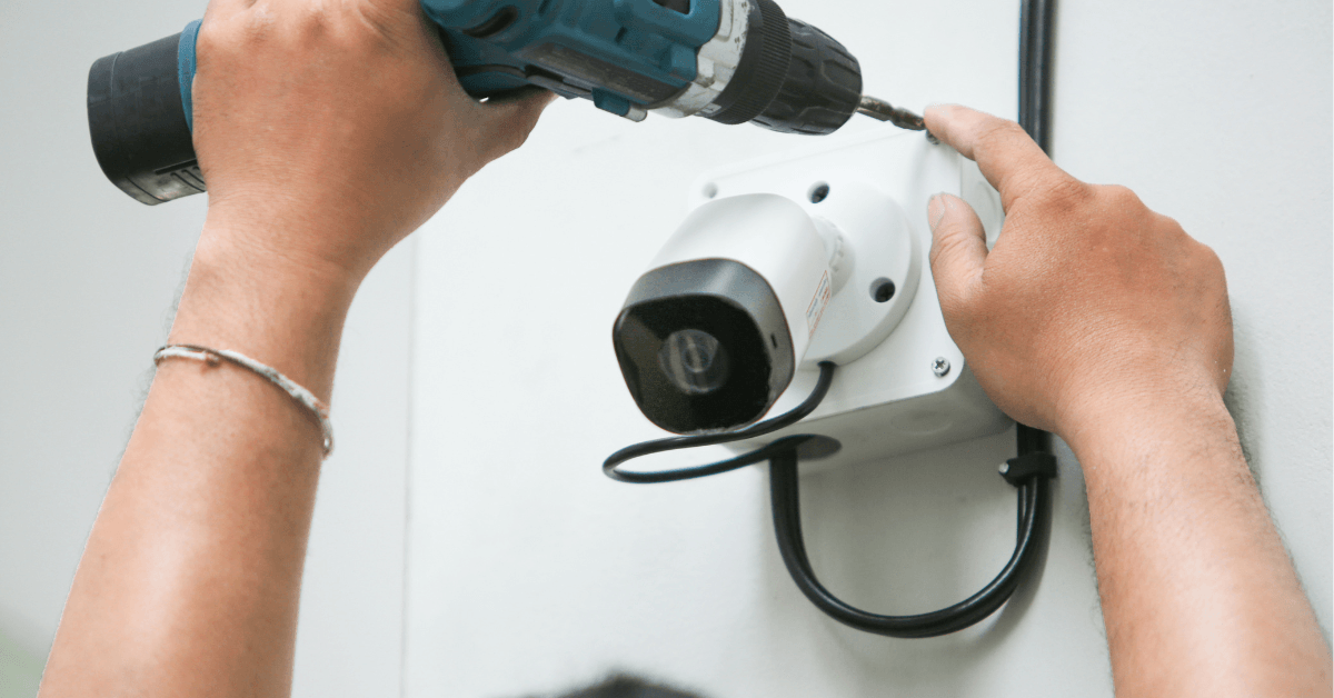 Technician doing a professional CCTV installation 