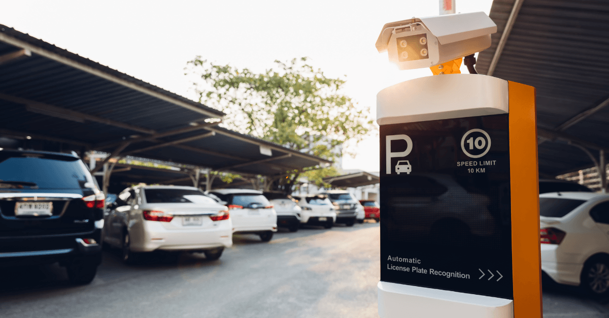 Vehicles at a parking entrance with an automatic licence plate recognition camera 
