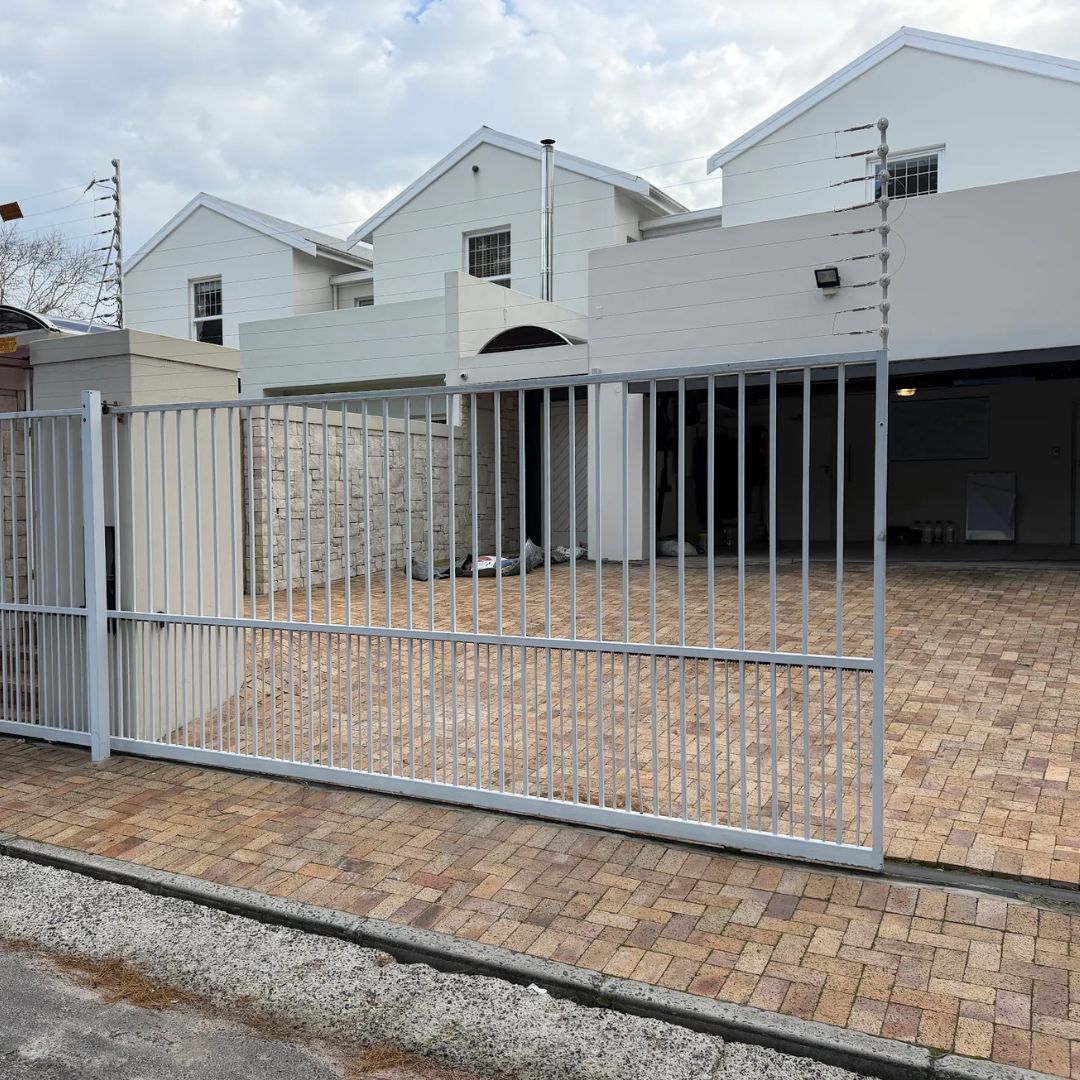 An electric gate outside a residential home